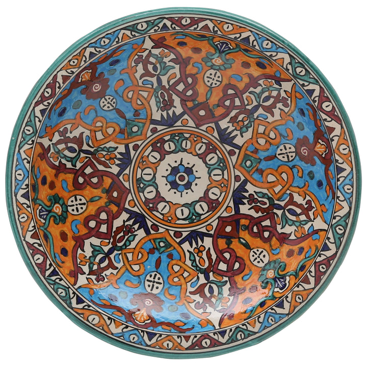 Ciotola in ceramica marocchina proveniente da Fès, dipinta a mano nei toni del turchese e dell’arancione, Ø 35 cm