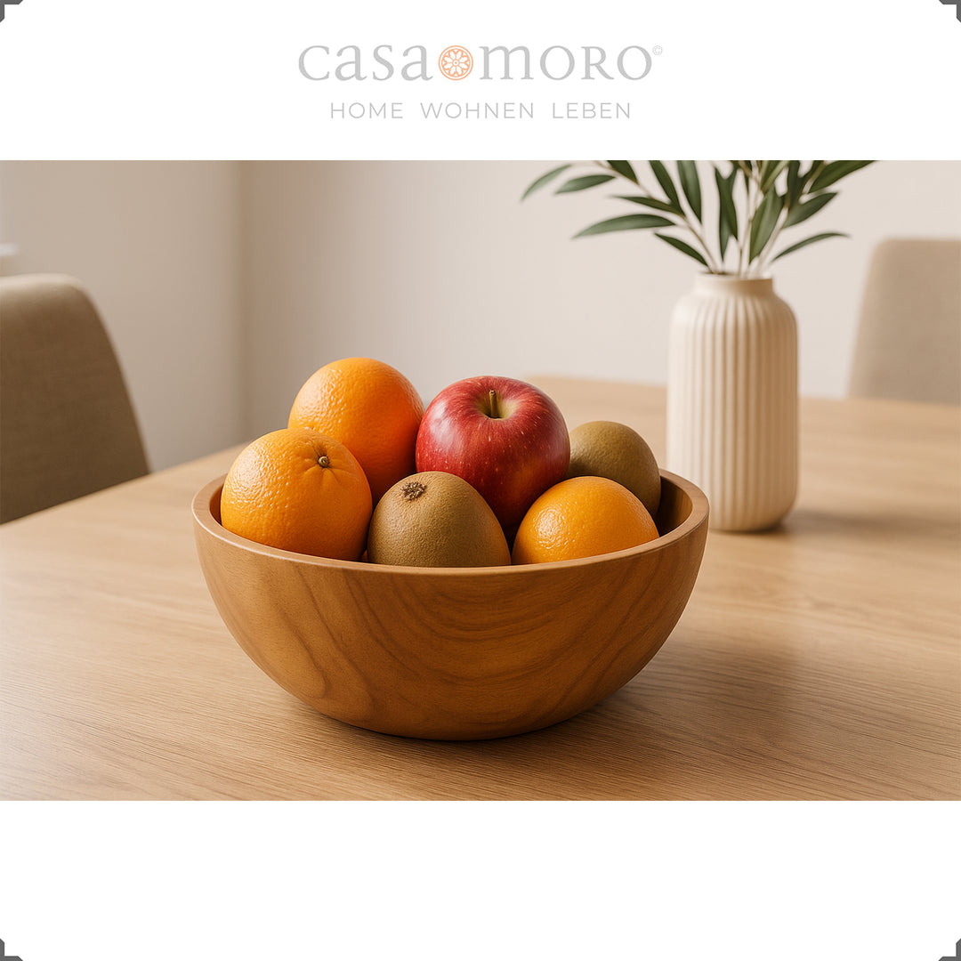 Ciotola in legno con frutta in tavola, ideale come decorazione da tavola