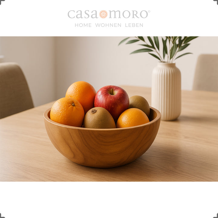 Ciotola in legno con frutta in tavola, ideale come decorazione da tavola
